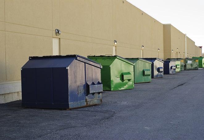 a construction dumpster filled with debris in Porter Ranch